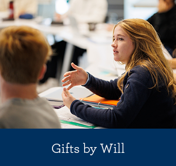 Students walking across campus. Gifts by Will Rollover