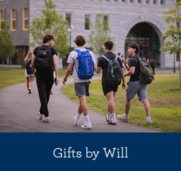 Students walking across campus. Gifts by Will Rollover
